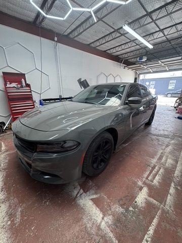 Gray Dodge Charger with window tint in Houston, TX